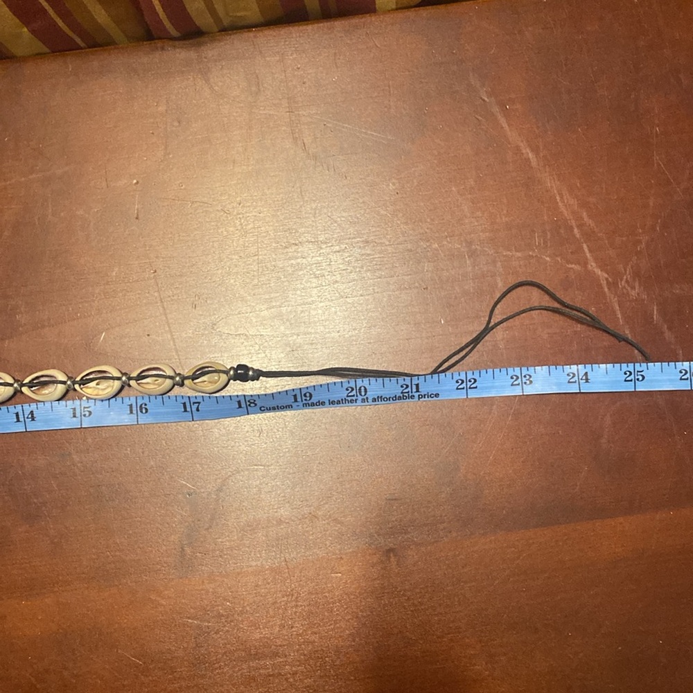 Vintage cowrie shell necklace on black cord. About 25 inches Can use as choker - Picture 3 of 4